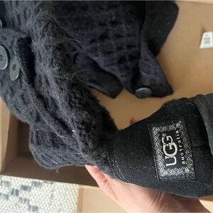 Tall black knitted Ugg boots with buttons